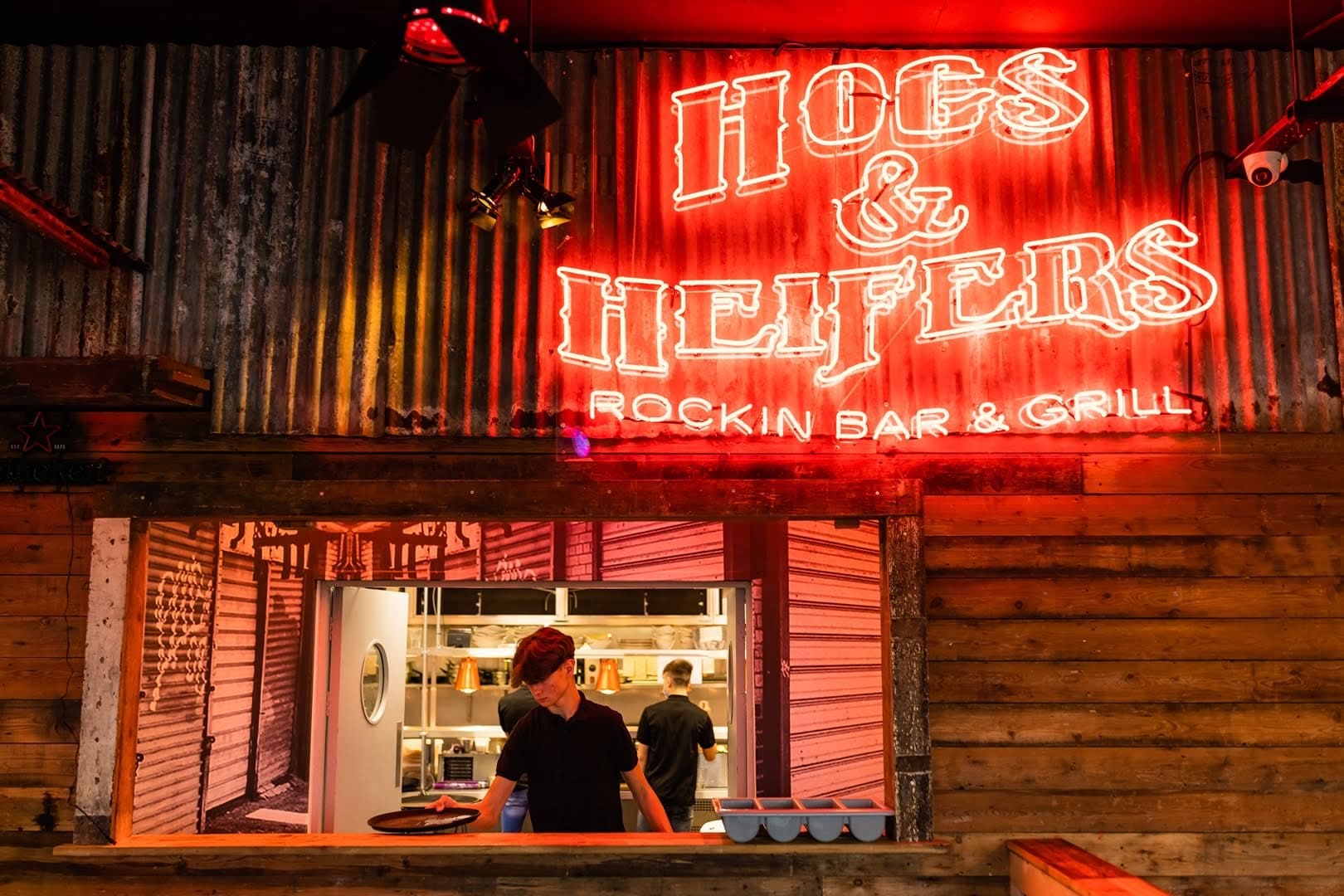 Hogs & Heifers neon sign